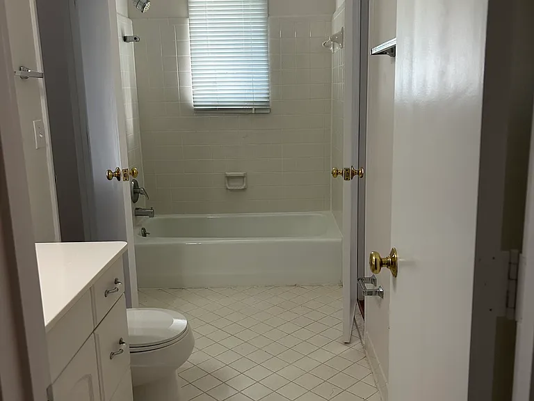 Jack and Jill hall bath, fresh paint and tile floor