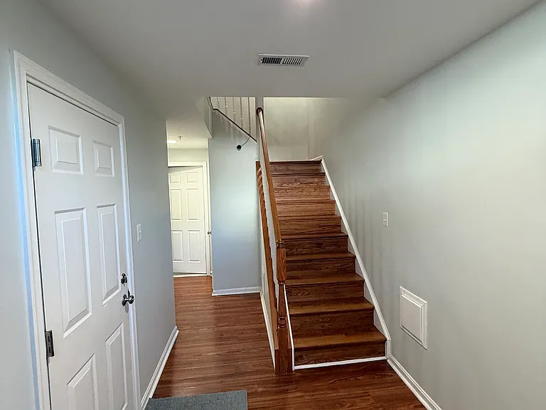 Entrance - garage on left , 2 rooms in the back gym and office