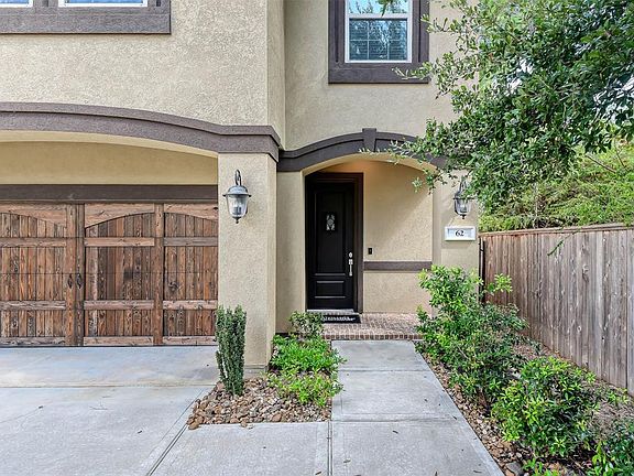 Pretty landscaping as you approach the front door.