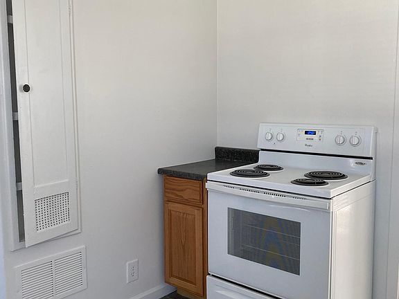 Kitchen-stove & spice cupboard