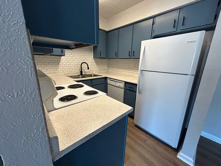 Fully-renovated kitchens provide TONS of storage above & below the resurfaced kitchen counters.