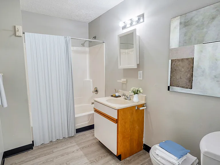 Elevate your living standards at Four Eight Group with this stunning bathroom design. Enjoy modern amenities and sleek finishes that enhance your everyday routine. Schedule a tour today and envision your new home!