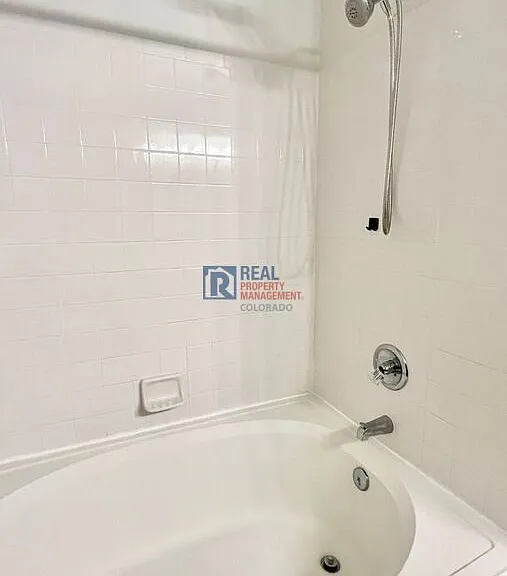 10784 W 63rd Pl #103 — Photo 17