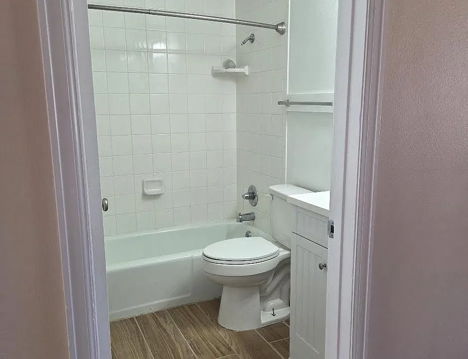 Bathroom also houses in-unit washer and dryer, which are included.