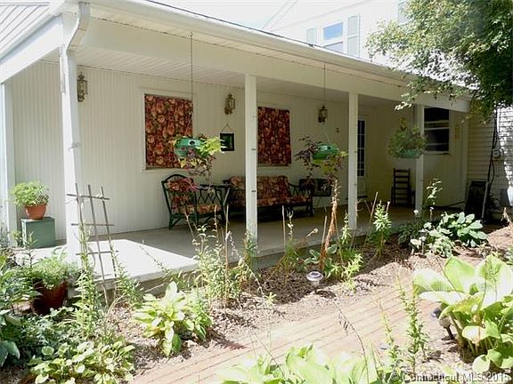 front porch with paver walkway