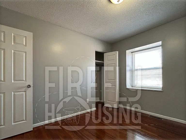 Bedroom #2 viewed from Hallway (at left).