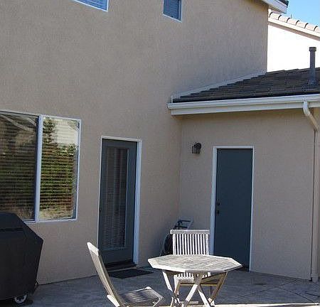 There is custom stamped concrete throughout the backyard