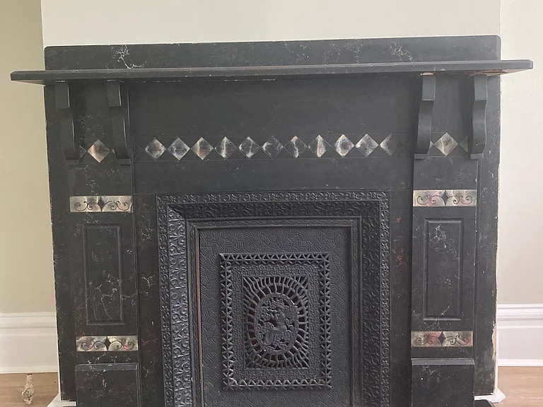 Original slate fireplace.