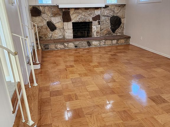 Living Room with resurfaced wood flooring.