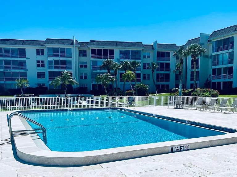 Pool #1. Just steps from units patio door. No steps to take as unit is ground level.