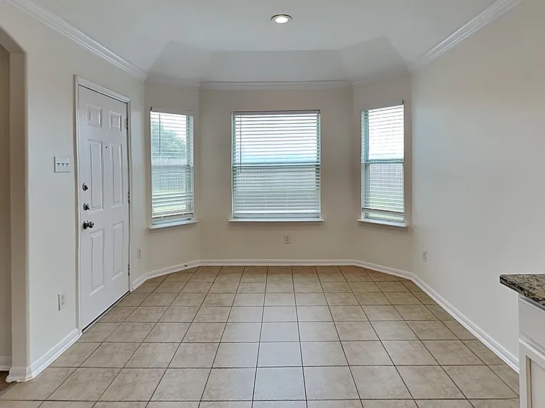 Spacious, well-lit room with n