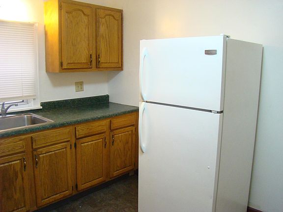 Full size refrigerator and gas stove with oven