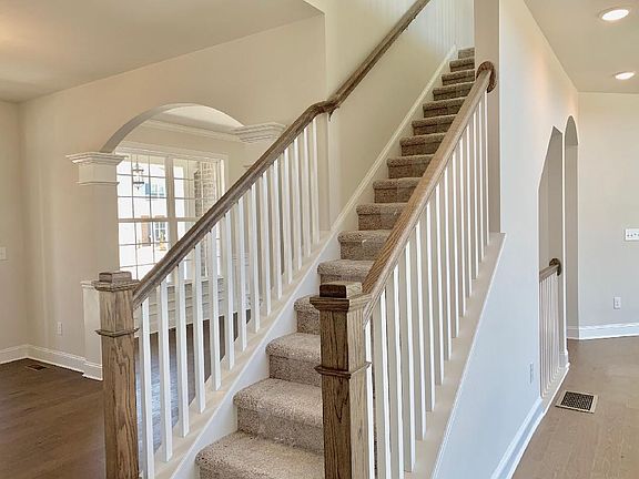 Open Staircase Railing with 2 x 2 Balusters and Wood Handrail