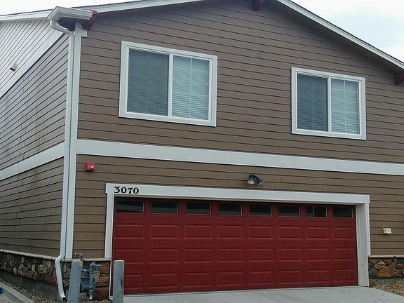 Large 2 car garage with extra storage space