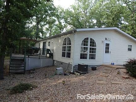 Breakfast room atrium windows and exterior concrete deck