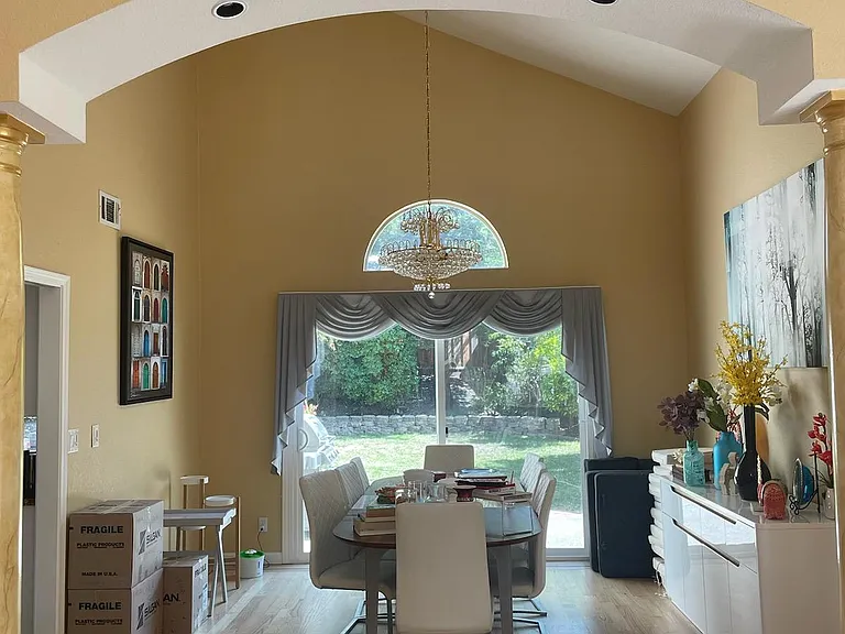 Dining room with custom built access to backyard.