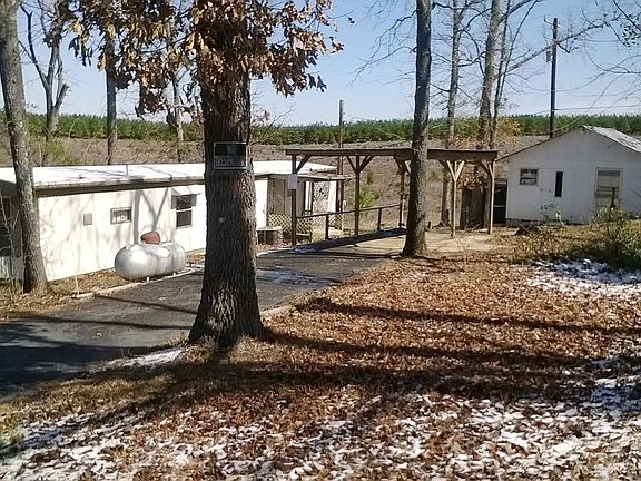 Asphalt driveway and carport!