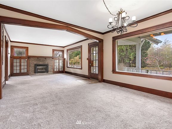 Large picture windows let in the natural light into the living and dining room.