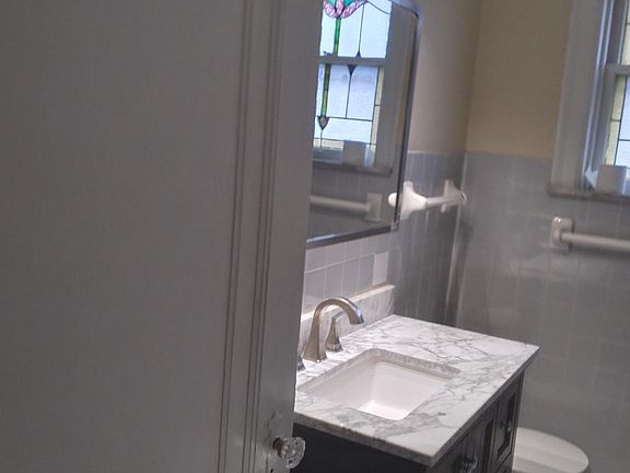 full bathroom with bathtub and shower