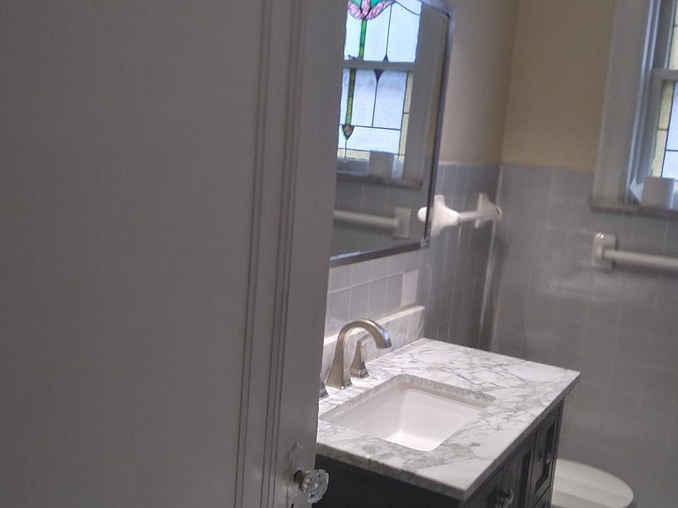 full bathroom with bathtub and shower