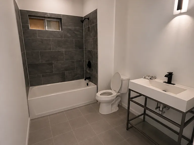 Modern bathroom rooms with updated showers and bathroom fixtures.