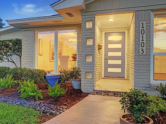 Front Entry: Walking up the new sidewalk youâll notice the contemporary five light front door with vibrant accent color and satin glass.