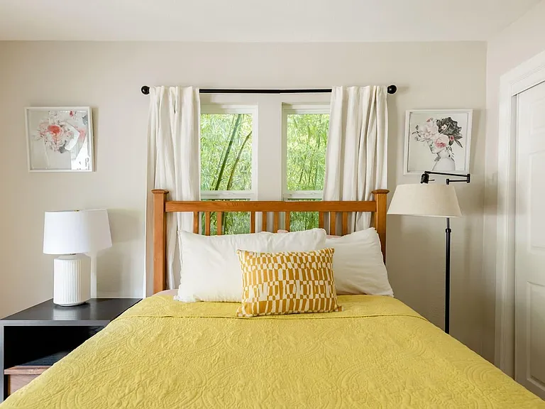 This is the primary bedroom with the attached bathroom.