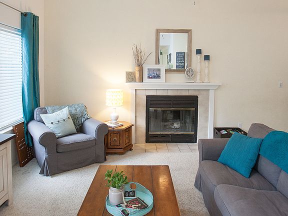 High ceilings & fireplace! 