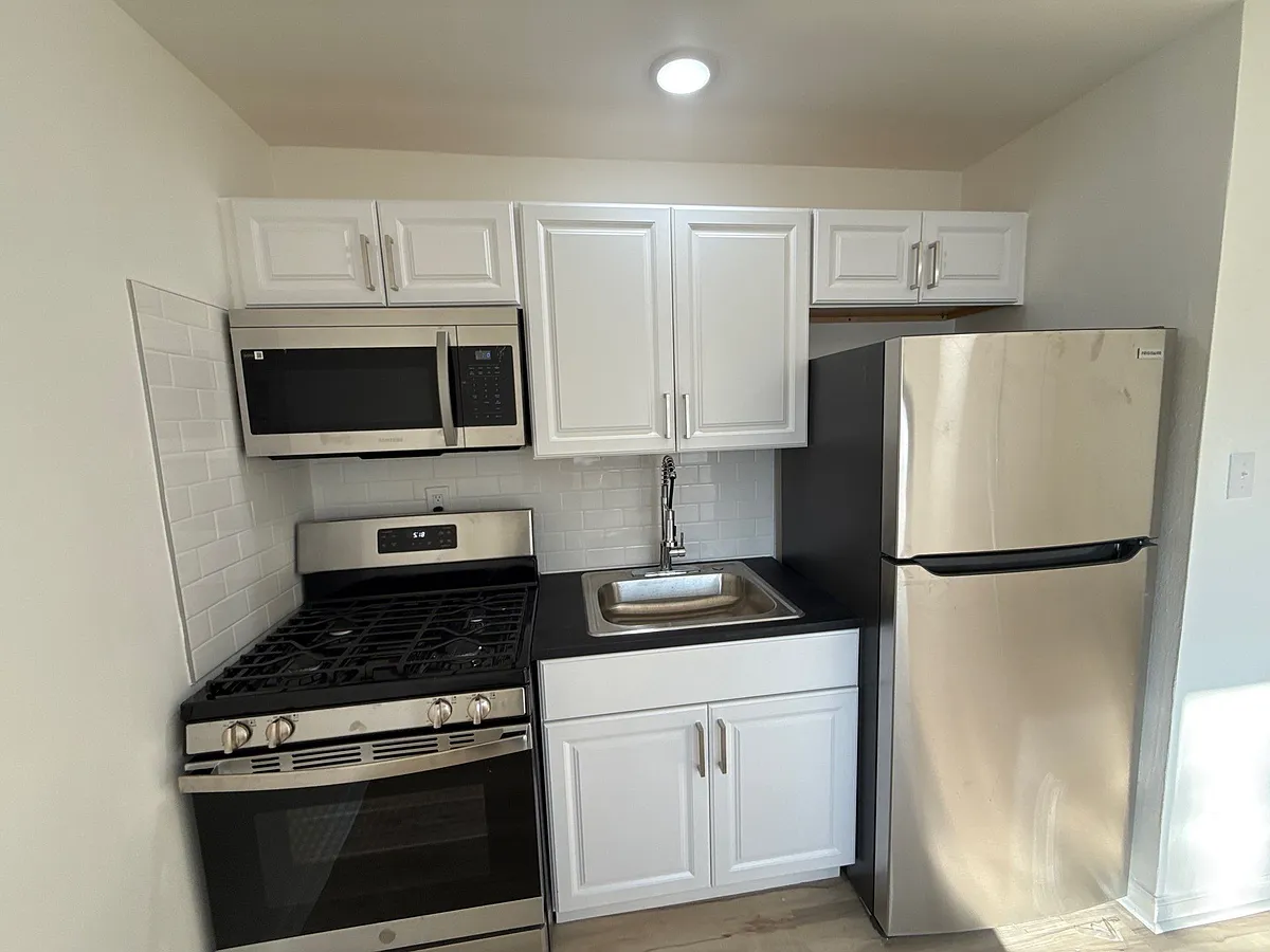 Building Photo - 3912 Kirkup Ave #3
