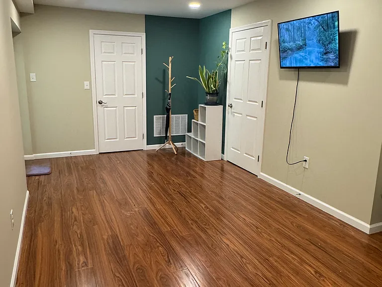 Living room- right door- laundry room