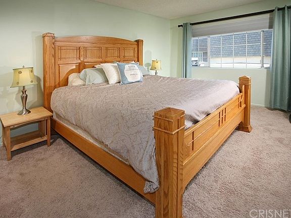 The spacious master suite has a two tone designer
