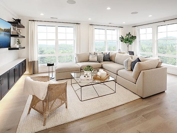 Living room surrounded by natural light