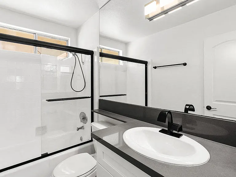 Modern styled bathroom with shower and tub.