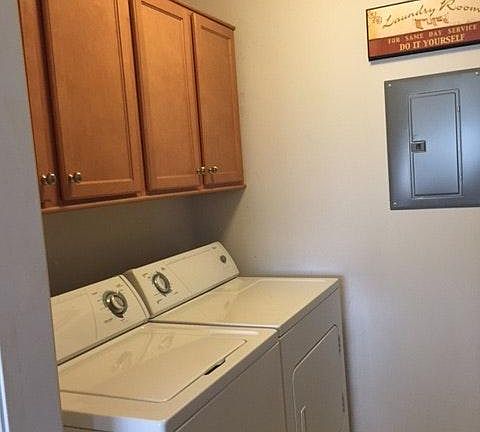 In unit washer and dryer with storage