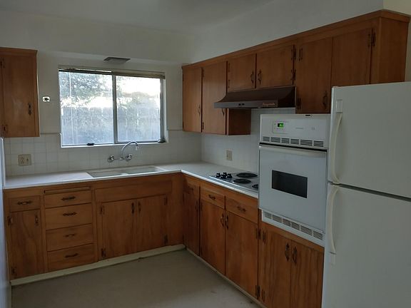 Kitchen with newer appliances.