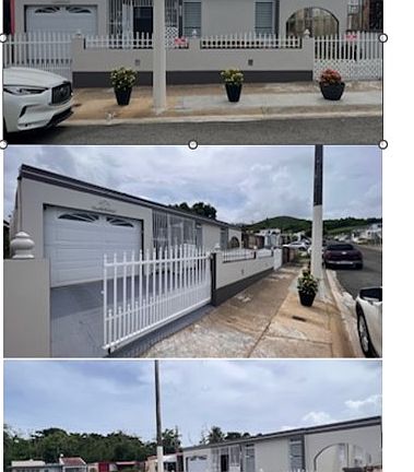 Front of house. Automatic garage door with remote control.