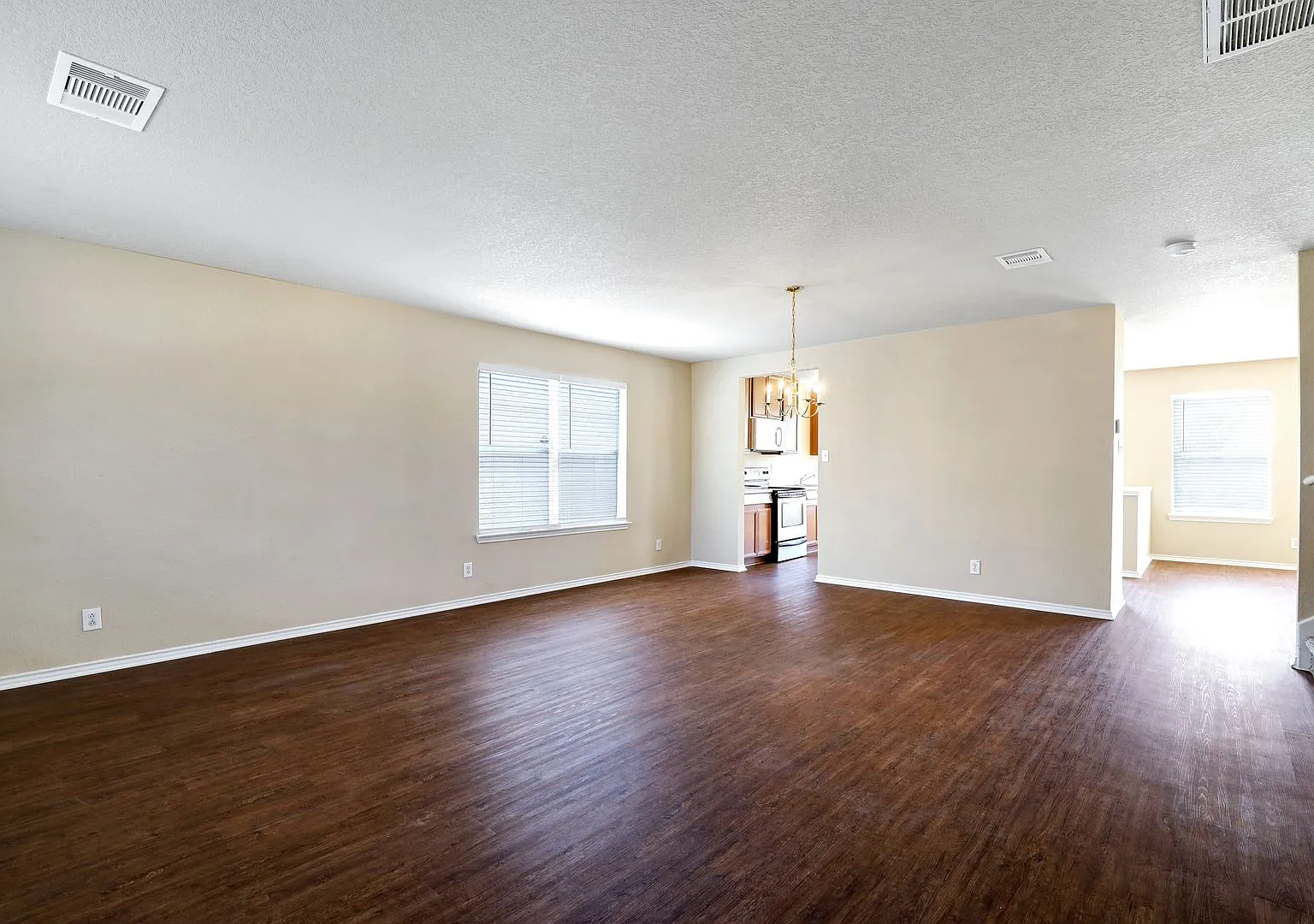 Spacious 4-Bedroom Home with Modern Upgrades and Multiple Living Areas — Photo 3