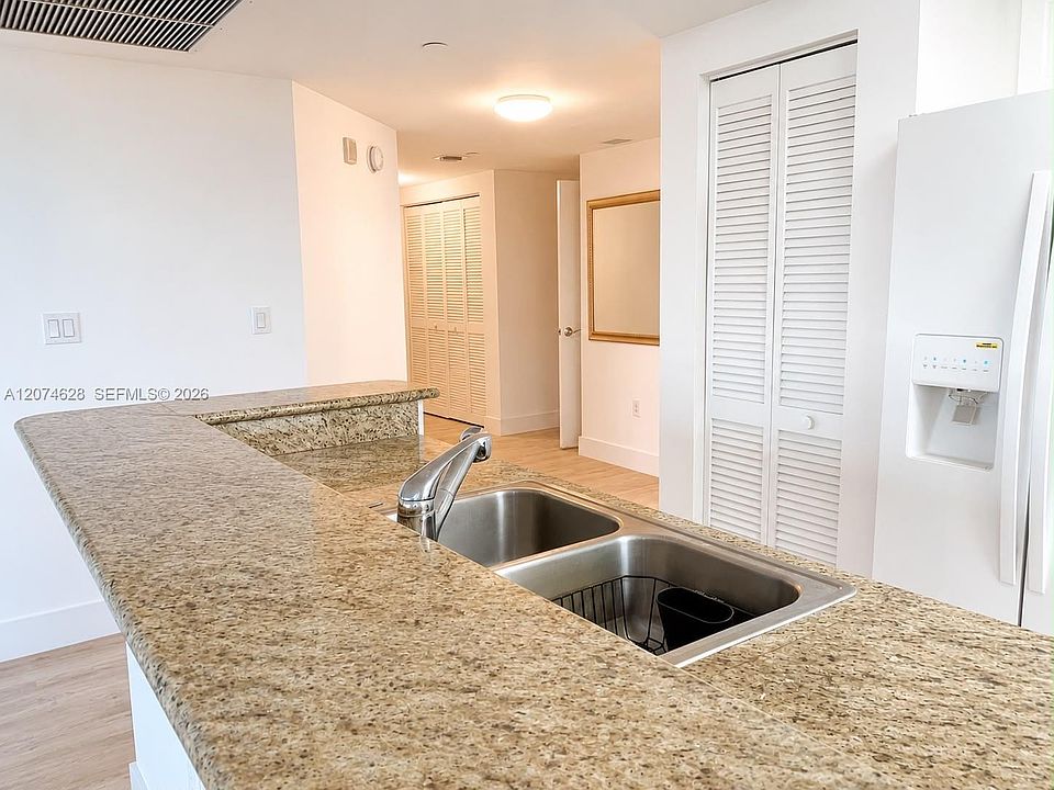 1st image of 19501 W Country Club Dr APT 408