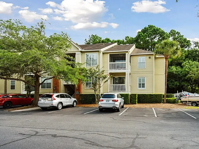 Exterior with surface lot parking