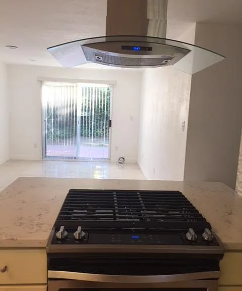 Living room with access to backyard