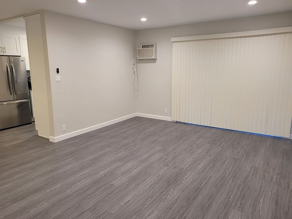 View of living room with a/c unit that works well to keep your space cooled off