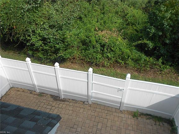 Peaceful, green and wooded view of the back!