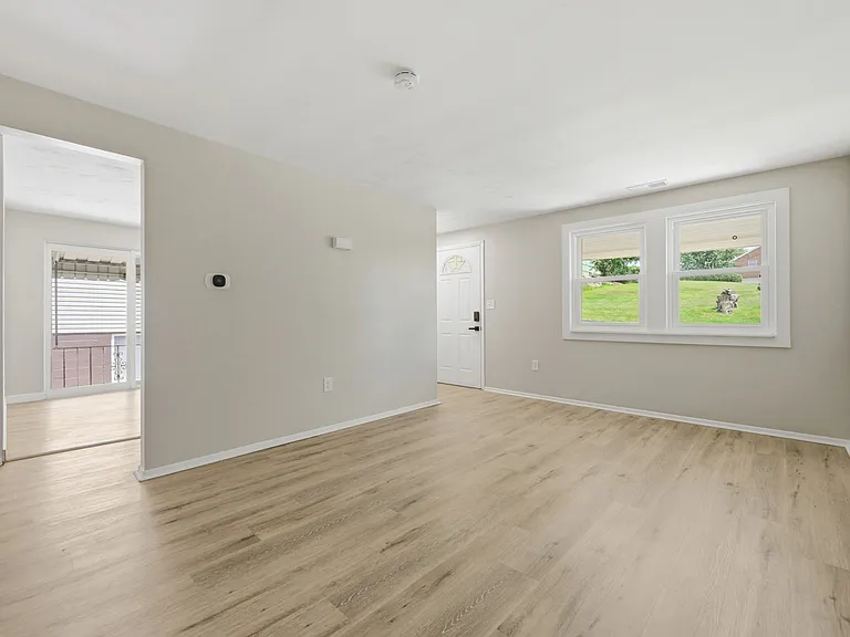 Living Room. Natural light! Kitchen to the left.
