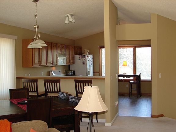 HUGE Kitchen w/ Breakfast Bar, Pantry and Good Amount of Cabinets....NEW FLOOR