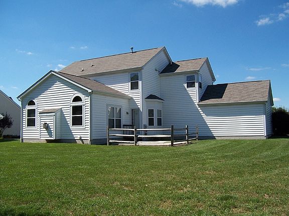 Nice View Of The Home With A Back Yard