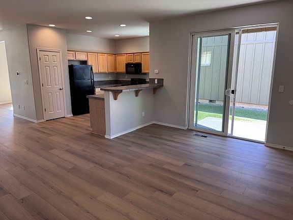 Bar area and sliding glass door to side yard area