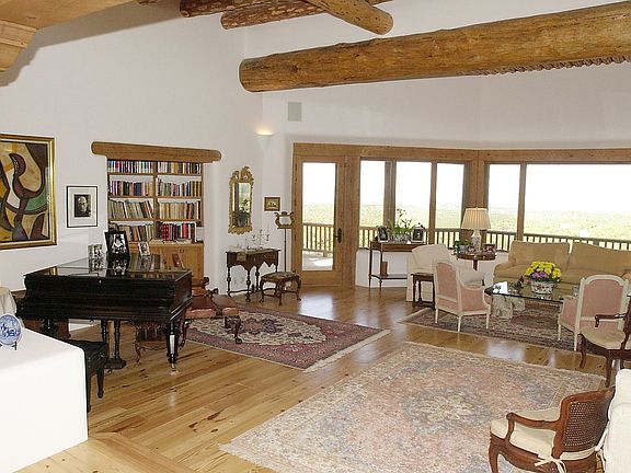 Through the front door and two steps down is this beautiful large room with picture windows with vie