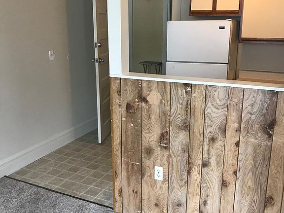 Living room looking back towards kitchen and front door