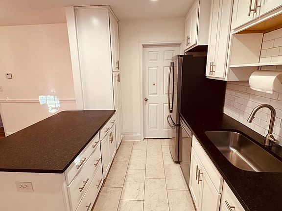 Remodeled Kitchen with Stainless Appliances and Granite