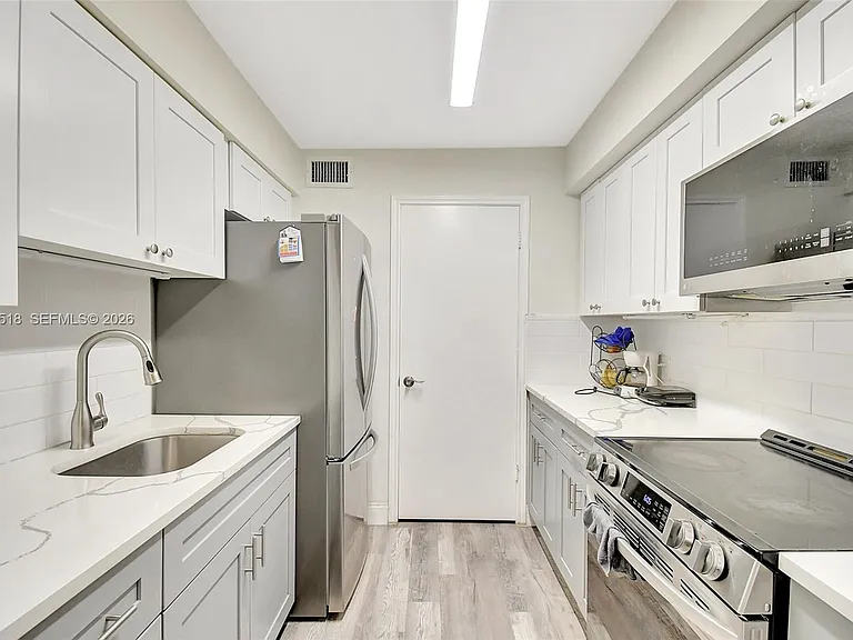 2445 NW 33rd St #1410 — Photo 11